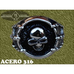 Anillo de acero, calavera garras