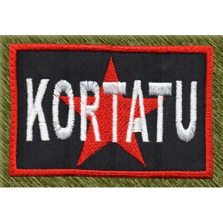 Parche bordado, kortatu